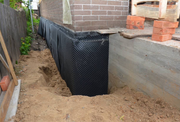 SJ Waterproofing Pros technician performing targeted Waterproofing assessment in New Marshfield, OH